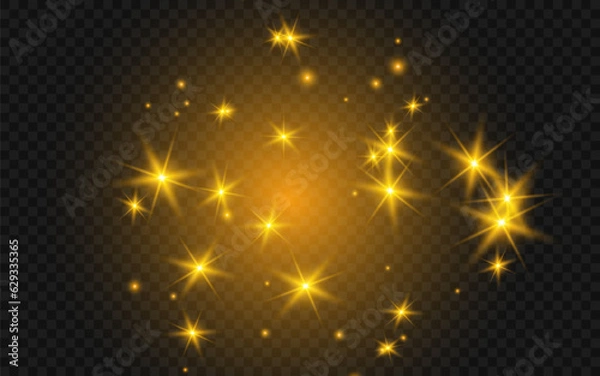 Fototapeta The dust sparks and golden stars shine with special light. Vector sparkles on a transparent background. Christmas light effect. Sparkling magical dust particles.