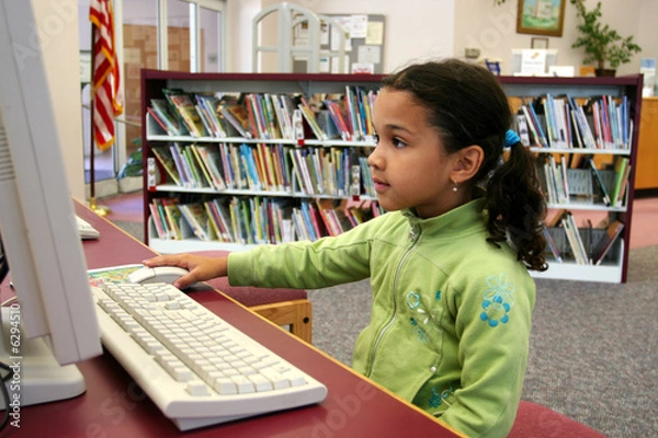 Obraz Child in a school library