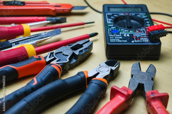Fototapeta Different types of tools screwdrivers, pliers, nippers.