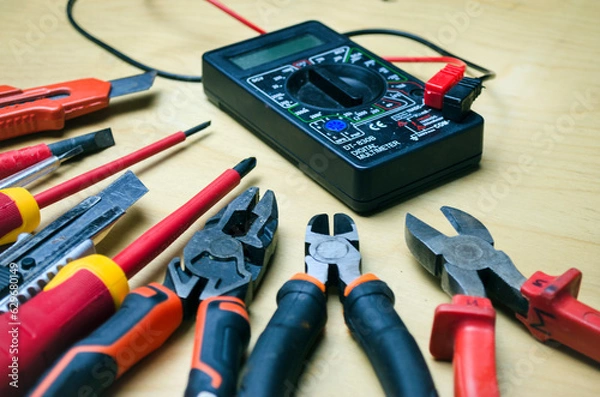 Fototapeta Different types of tools screwdrivers, pliers, nippers.