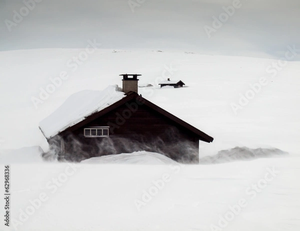 Obraz mountain huts in snow storm