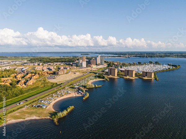 Obraz Almere Poort marina and the new residential neighbourhood with highrise apartment buildings in Almere, Flevoland, The Netherlands