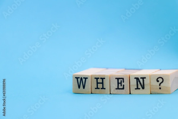 Obraz The word "when?" on wooden cubes