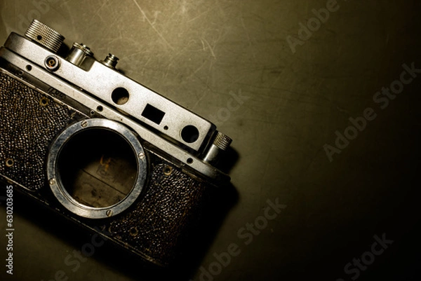 Obraz old camera on a black background