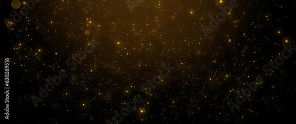 Fototapeta Gold particles abstract background with shining golden particle stars dust. Beautiful futuristic glittering in space on black background.