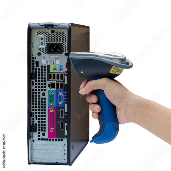 Obraz Holding and Scanning label on the computer with wireless barcode