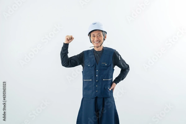 Fototapeta 力こぶを作る職人　大工