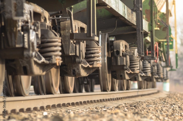 Fototapeta Wheel pairs of trains in motion