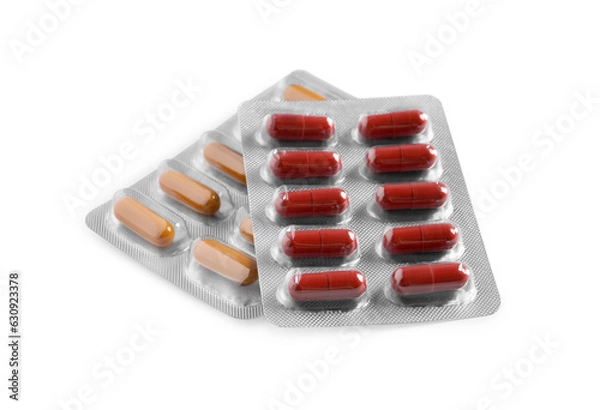 Fototapeta Blisters with different pills on white background