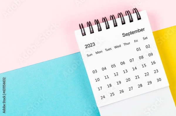 Fototapeta The September 2023 Monthly desk calendar for 2023 year on beautiful background.