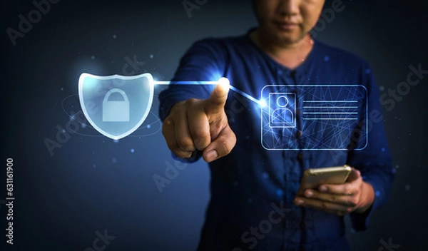 Fototapeta man pushing security shield and identiftcation icon. Internet security concept.