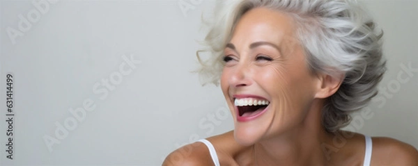 Obraz A Beautiful Middle Aged Woman, Mid-Aged Model in 50s with Healthy Skin and Gorgeous Teeth, Laughing and Smiling With Genuine Happiness, Portrait, Generative AI