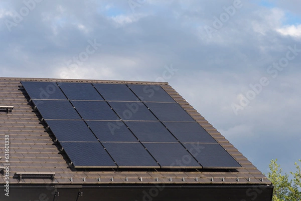 Obraz new building with solar panel on rooftop