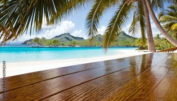 Fototapeta Slanted wooden table for displaying items with beach and palm trees and island at tropical resort in the background - AI-Generated