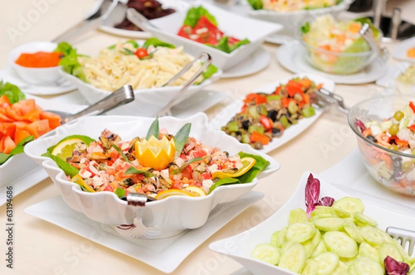 Obraz Diversity of salads on the table