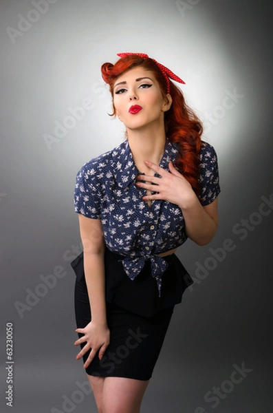 Obraz Pin up girl blowing a kiss