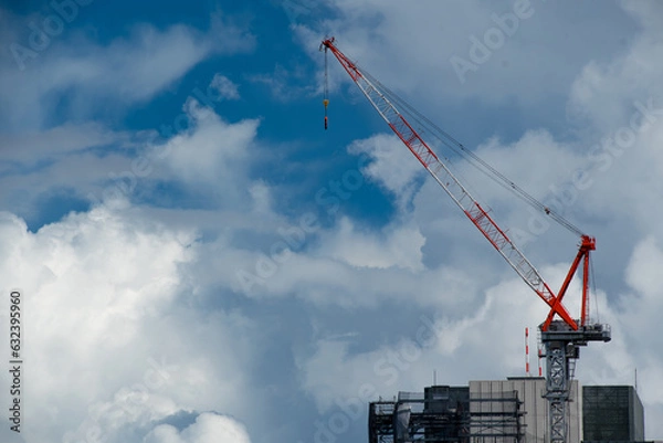 Obraz ビルの上の建築用の大型クレーン