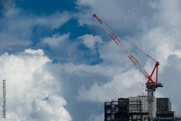 Obraz ビルの上の建築用の大型クレーン