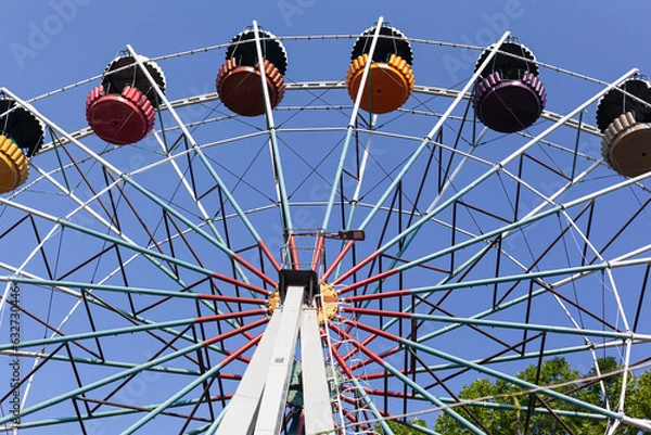 Obraz ferris wheel on a blue sky