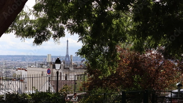 Obraz Paris, city view from a small park with trees and the Eiffel tower