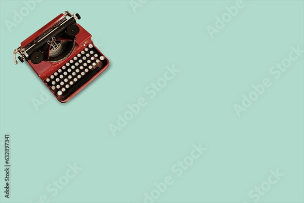 Obraz Vintage typewriter on green flat background