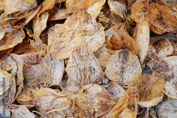 Obraz Dried salted fish as a background. Close-up.