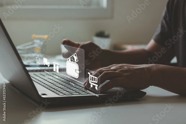 Obraz Online shopping and Online payment concept. Businessman holding credit card and typing on laptop for online shopping and payment makes a purchase on the Internet, Business financial and technology.