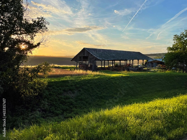 Obraz A rustic farmhouse nestled in tranquil countryside beauty
