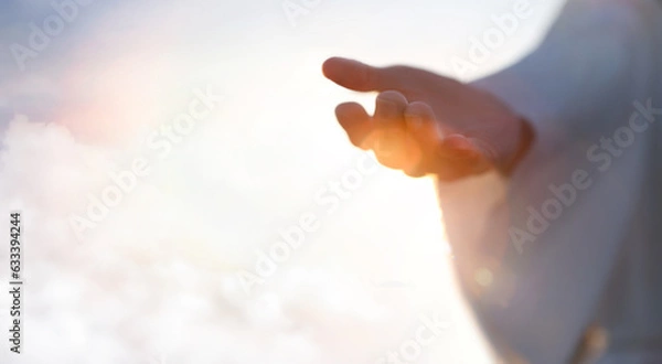 Obraz Jesus Christ with open arms reaching out in the sky, hand gestures of Jesus dying on the cross and resurrected, heaven and salvation, faith and love, easter concept
