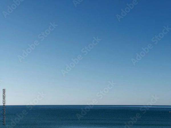 Fototapeta Empty calm Mediterranean sea and empty blue sky