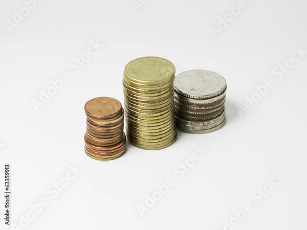 Fototapeta Coins stack with close up isolated on white background