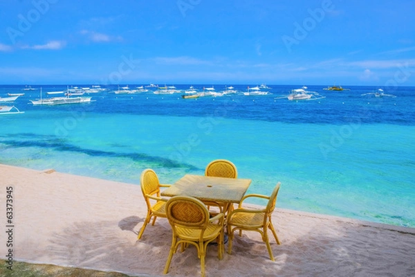 Obraz Table and chairs on tropical beach