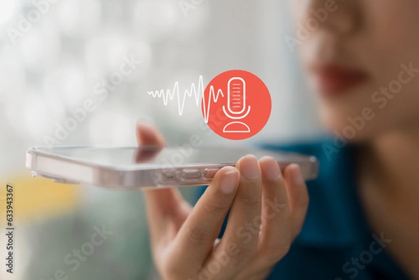 Fototapeta Modern Voice Recording, Hand Holding Microphone Icon on Smartphone Capture Sound Music and Voice Messages with this Voice Recording App. Use AI Enabled Internet Search for Easy Access to Information.