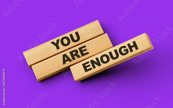 Fototapeta Wooden blocks with are you enough word on colorful isolated background 3d illustration