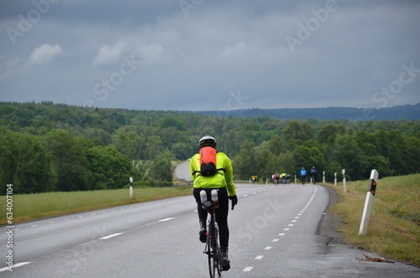 Obraz person riding a bike