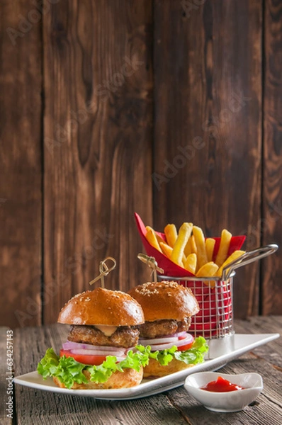 Fototapeta hamburger on a wooden background