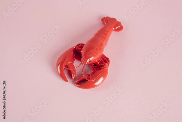 Obraz a red lobster on a pink background