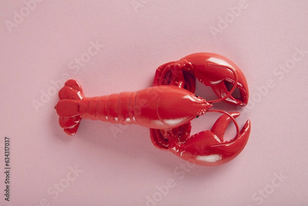 Obraz a red lobster on a pink background