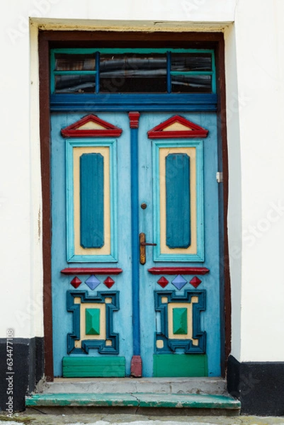 Fototapeta Ornate colored door
