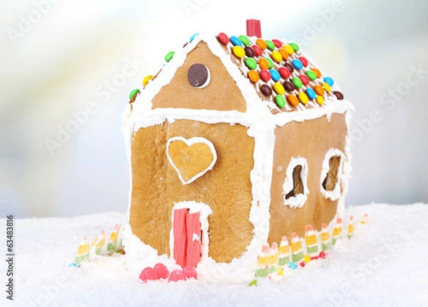 Fototapeta Gingerbread house on light background