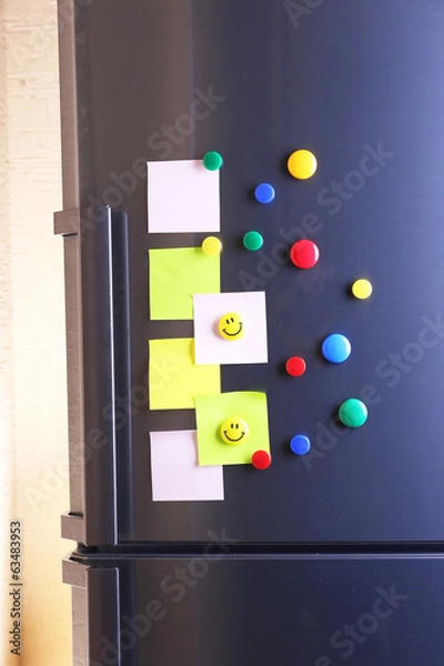 Fototapeta Empty paper sheets and colorful magnets on fridge door