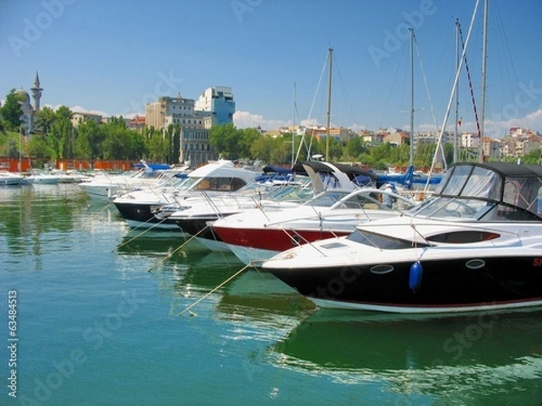 Obraz Sailboat and Yacht  anchored in the small port Tomis