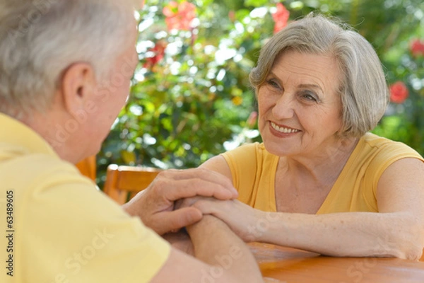 Obraz couple sitting at at table