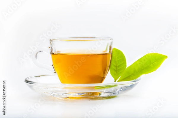 Fototapeta Green tea leaf and glass cup of black tea isolated on white back