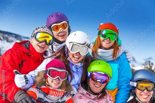 Fototapeta Seven smiling friends wearing goggles