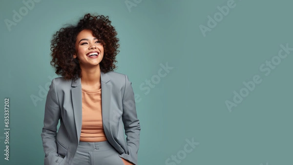 Fototapeta Successful cheering afro-american businesswoman is satisfied with the results of the achievement
