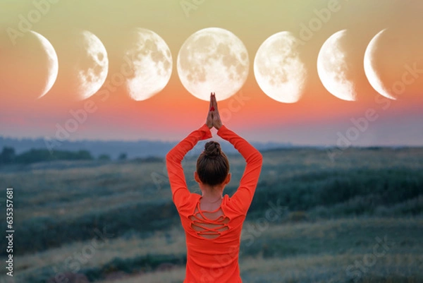 Obraz a girl in nature in a pose of balance and the phases of the moon in a clear sky