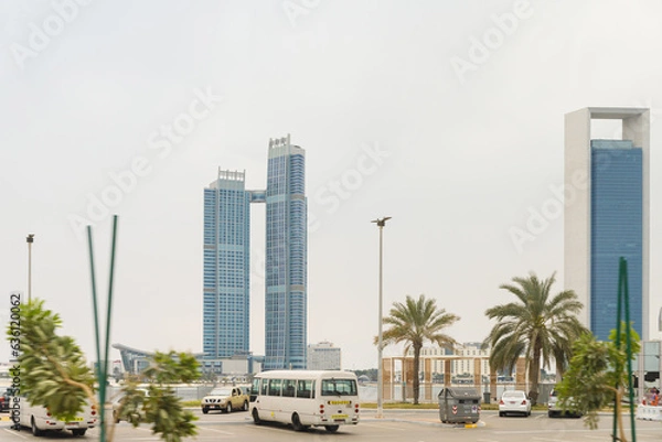 Fototapeta View from the window of a tourist bus on the architecture of the city of Abu Dhabi, United Arab Emirates