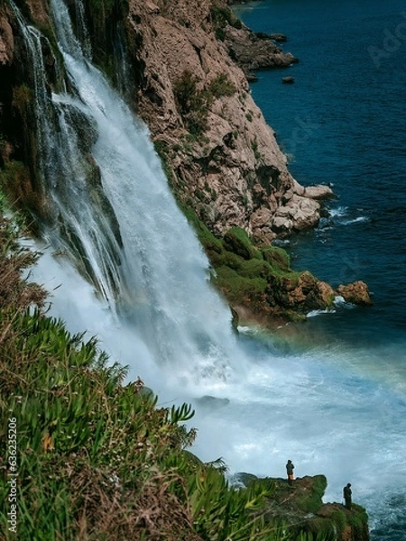 Obraz waterfall and  fisherman 