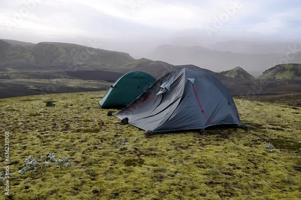 Obraz A tent flapping in strong wind. Landmannalaugar, Iceland, Europe. Windy day. 
